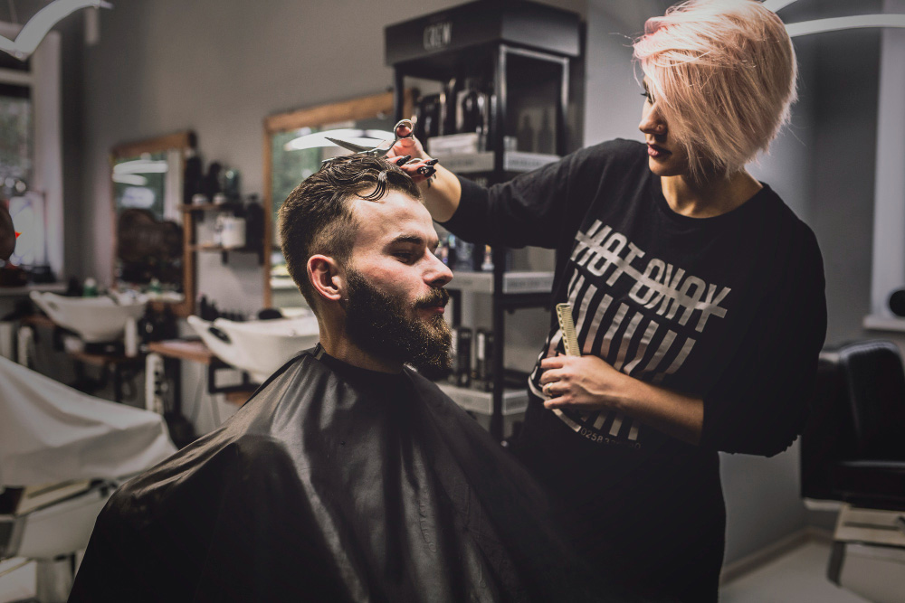 Barber giving a straight razor shave